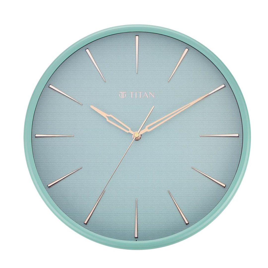 Titan WALL CLOCK Peacock Green Wall Clock in a Matte Finish with a Textured Dial - W0013PA02 - KRISHNA WATCH COMPANY