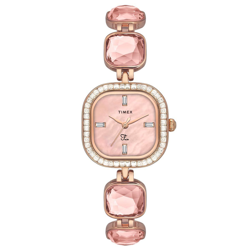 A TIMEX Fria women's watch with a white dial, round case, and pink gemstone accents on the bezel.