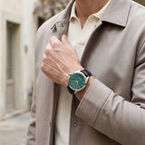 Titan Automatic Teal Dial Black Leather Strap Watch For Men 10077sl03