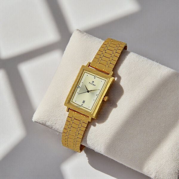 Titan Champagne Dial Golden Stainless Steel Strap Watch 1715YM02