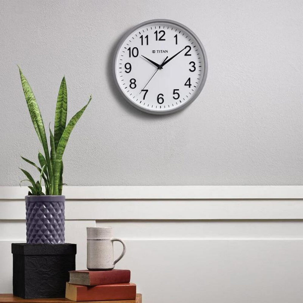 TITAN Wall Clock with Silent Sweep Technology - W0001PA01A - KRISHNA WATCH COMPANY