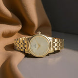 Titan Quartz Analog Champagne Round Watch For Women - 2593YM01 - KRISHNA WATCH COMPANY
