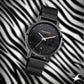 Fastrack Animal Print Quartz Analog with Date Black Dial Stainless Steel Strap Watch for Girls np6222nm01 / 6222nm01