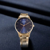 Sonata Quartz Analog Blue Dial Golden Stainless Steel Strap Watch For Men - 77144YM01