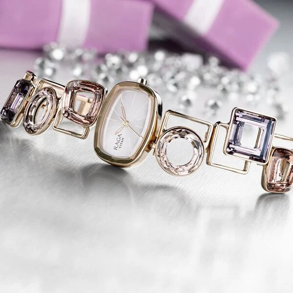 Titan Raga Facets Pink Dial Analog Stainless Steel Strap Watch for Women 95118wm02