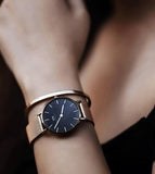 Daniel Wellington Petite Unisex Black Round Dial Analog Watch - DW00100303K