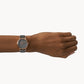 Fossil watch in wrist hand